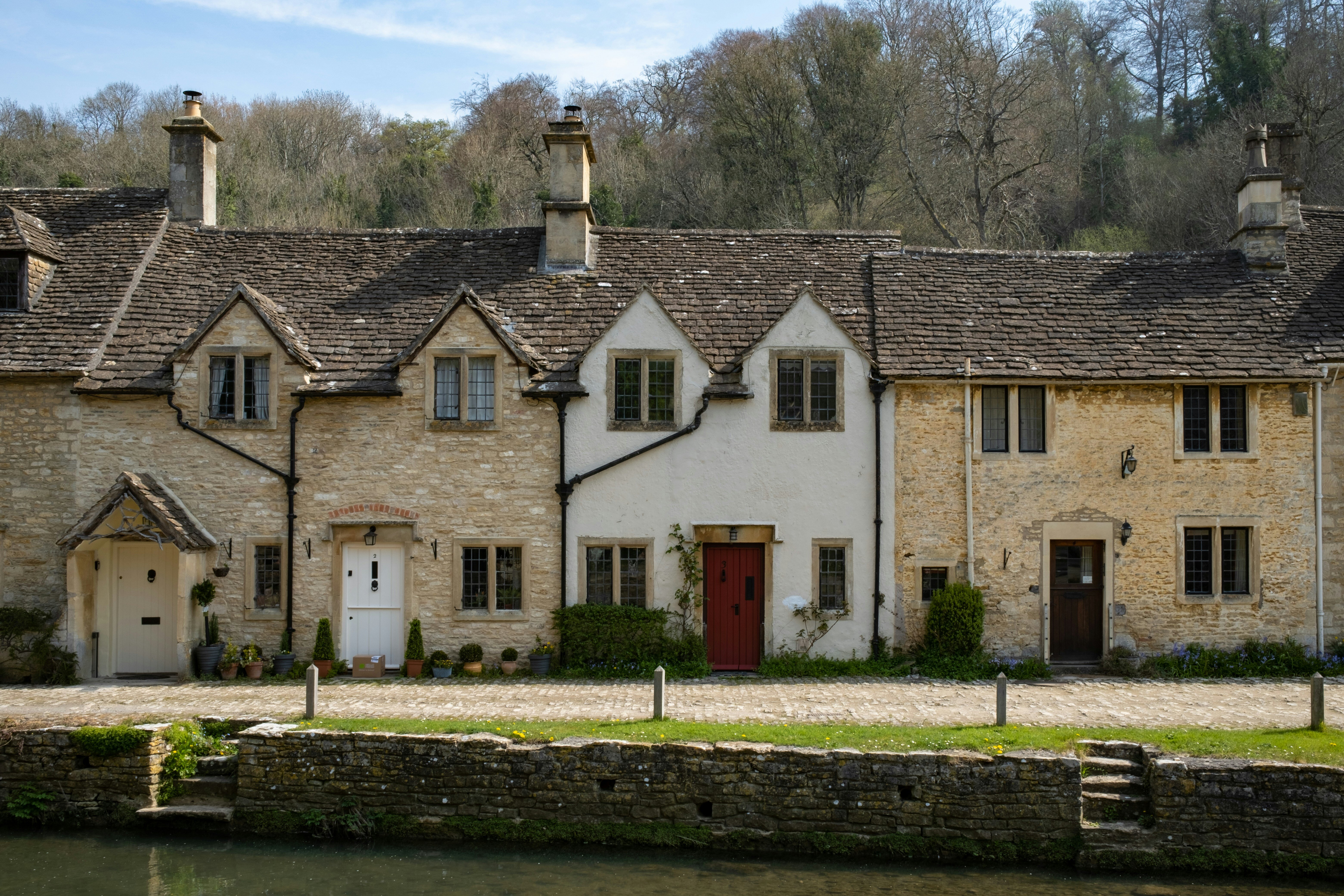 Terraced houses by the river in the countryside. 