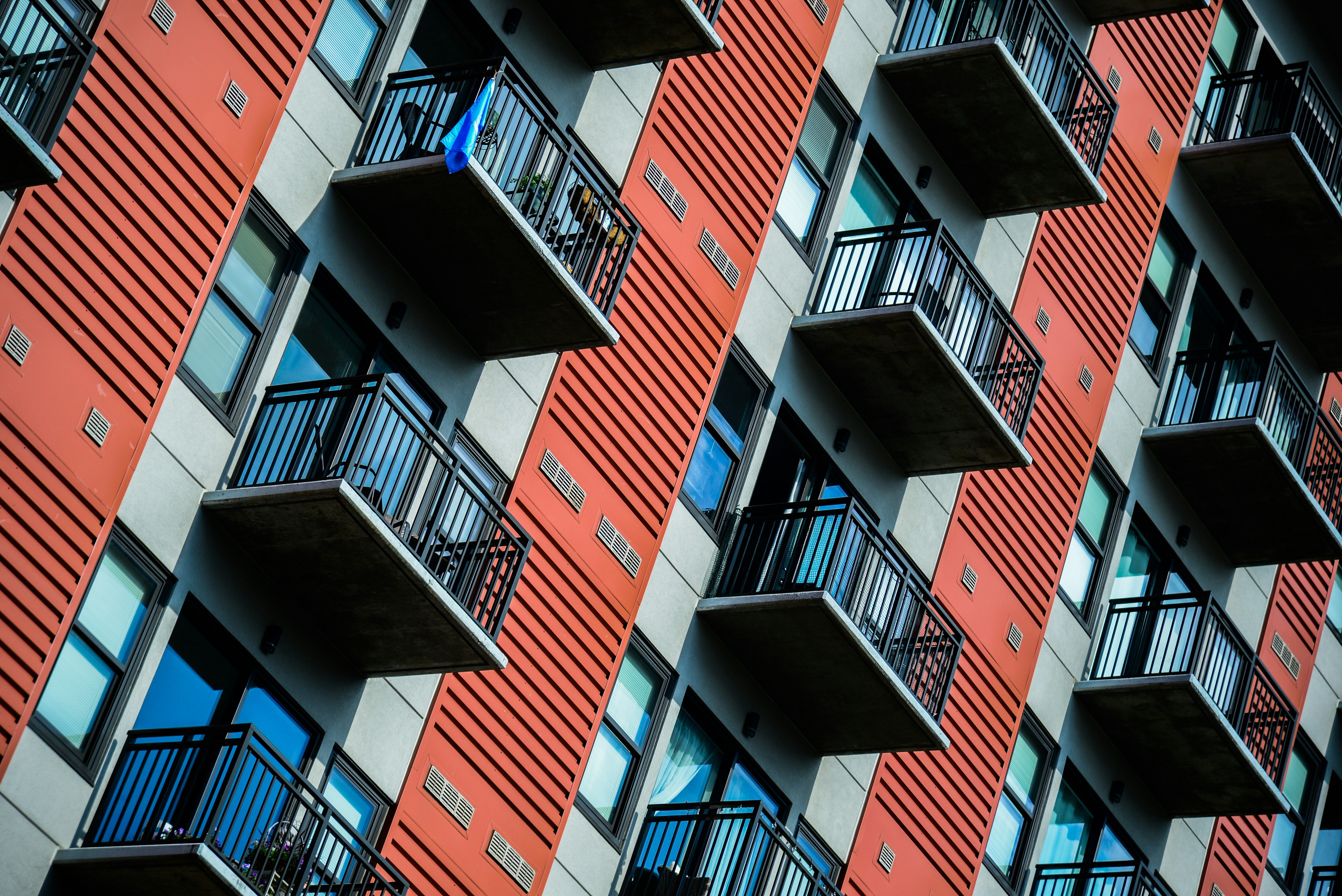 Modern, high-rise flats with balconies.